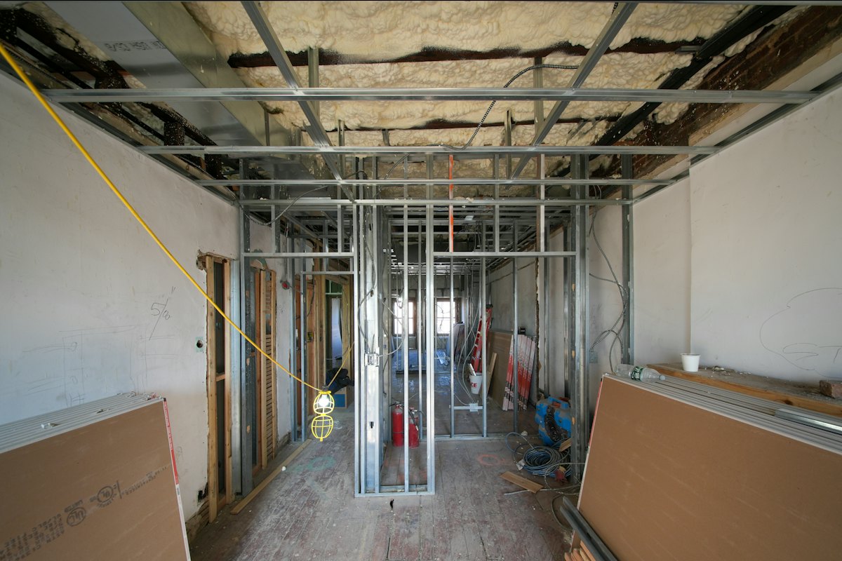 A room framed with metal studs and drywall panels