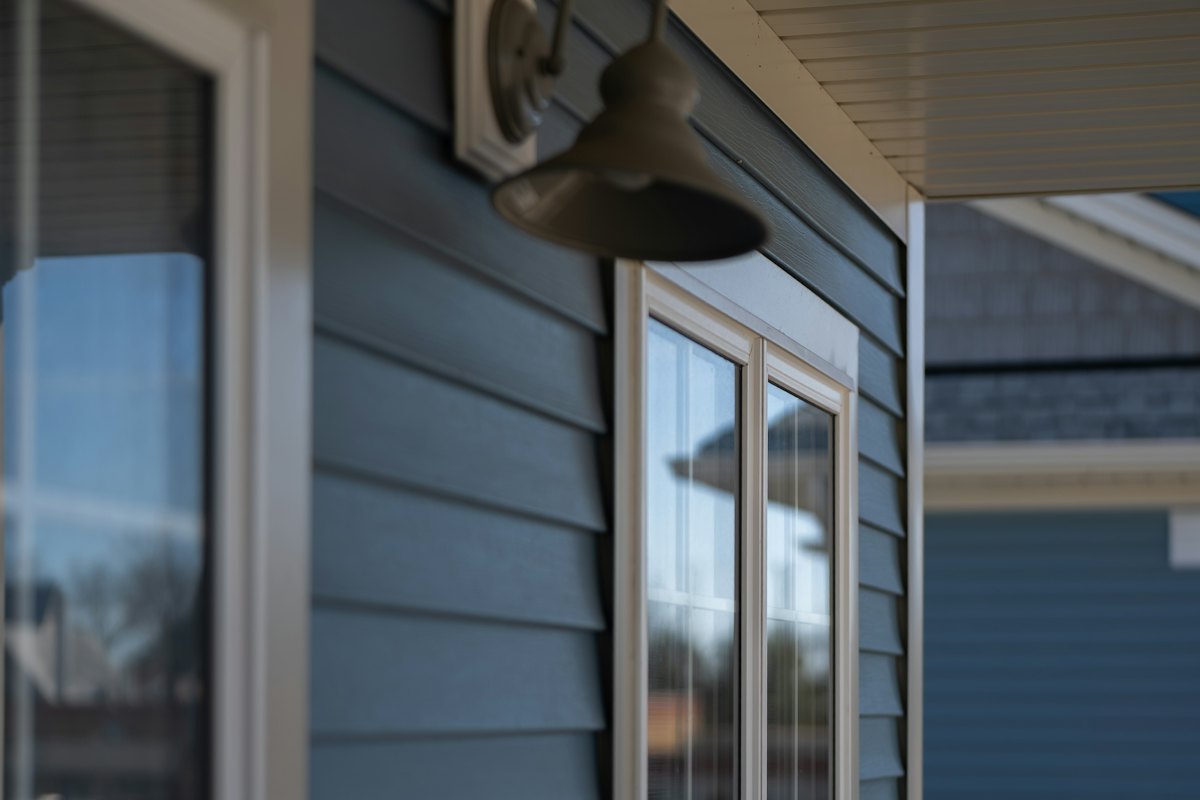A house with blue siding and white trim